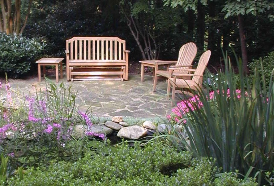 Patio with view of garden and pond